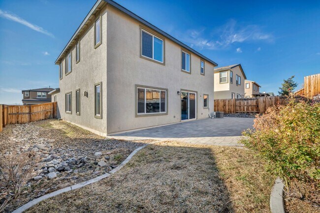Building Photo - Sun-Filled, Spacious Living with a Three-Car Garage