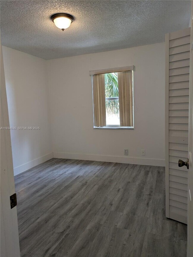 Building Photo - 2401 NW 56th Ave