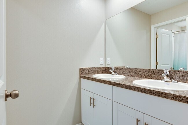 Building Photo - Spacious 5-Bed Touchstone Home – Primary Suite Downstairs, 2-Car Garage