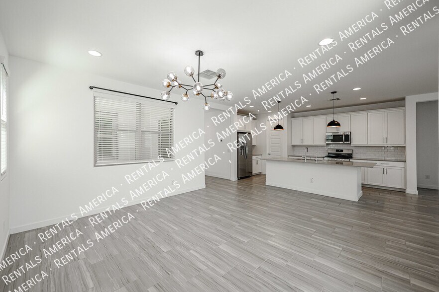 Building Photo - 12380 W Wagon Wheel Dr