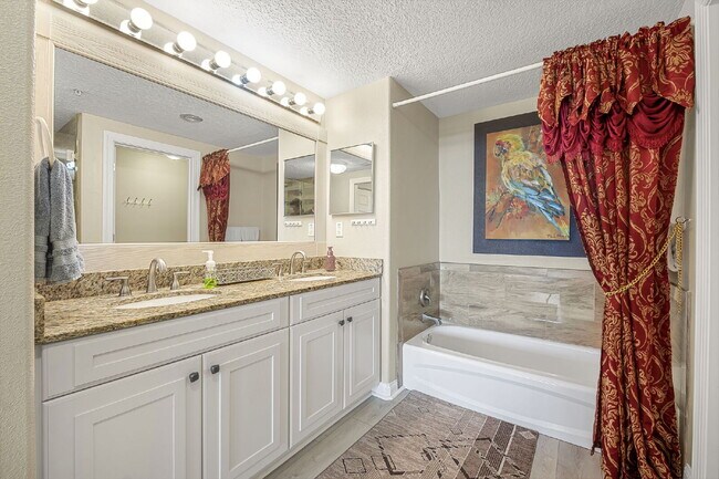 Building Photo - Available for a 7-12 month lease, Unit 208 has a beautiful oceanfront setting.