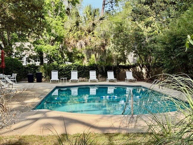 Building Photo - Top-Floor South End Villa Near Coligny Beach- Available Now!