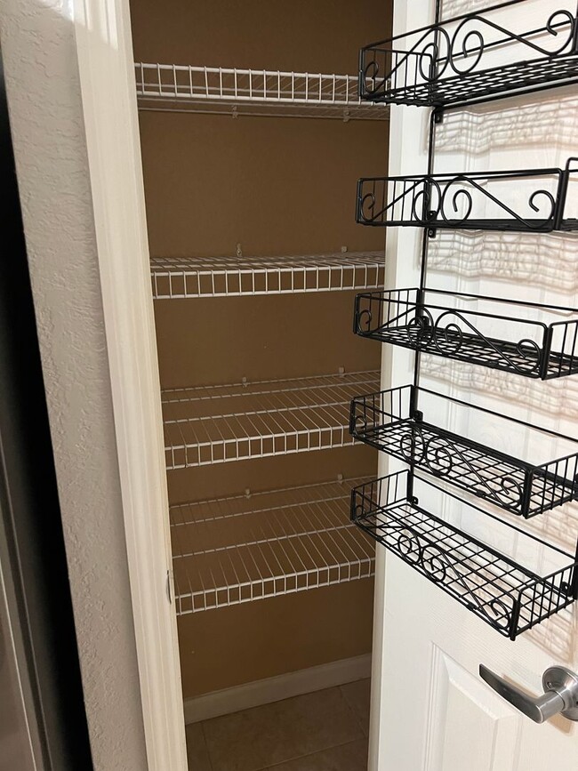 Building Photo - Spacious 3BR/2BA Gated Condo with Resort-Style Amenities!