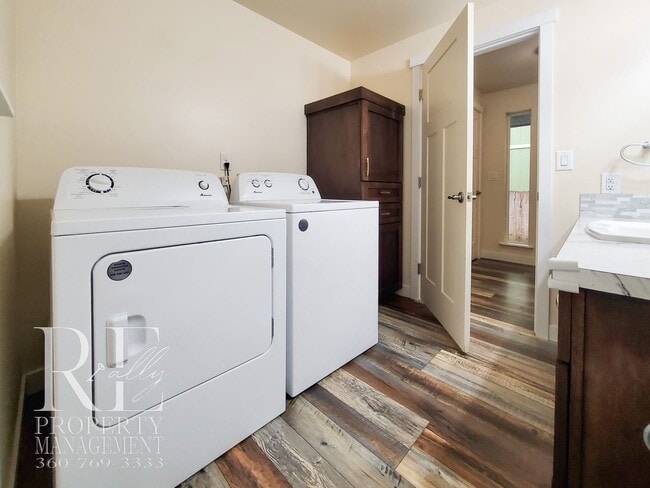 Building Photo - Modernized Two-Story with Open Layout, Gas Fireplace & Large Fenced Yard