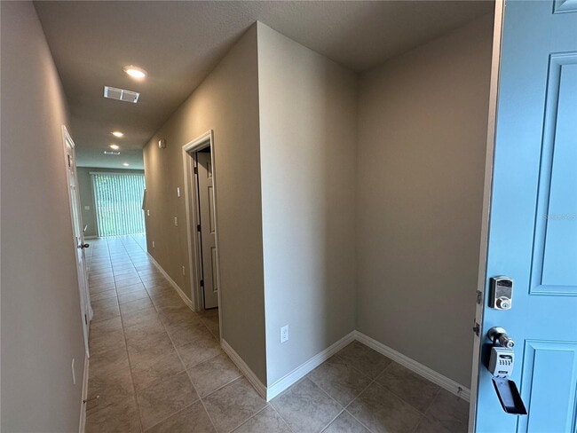 Building Photo - New 3 Bed, 2.5 Bath Townhouse for Sale in Davenport FL 33896 – Built 2023, Low HOA.