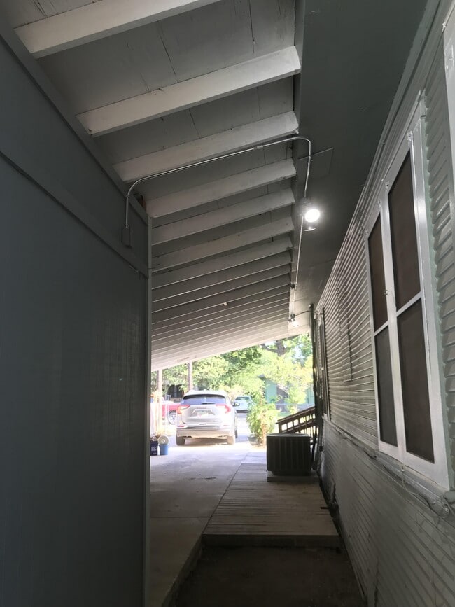 Newly rebuilt and roofed carport features workshop - 1105 Essex St