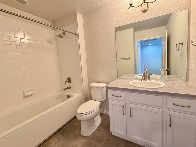 Building Photo - Move-In Ready 3-Story Townhome with Loft & 2-Car Garage