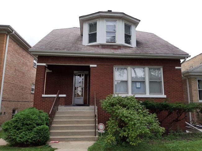 Building Photo - 5622 N Mango Ave