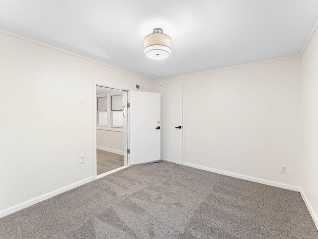 Building Photo - Fully Renovated 4-Bedroom Home with Large Fenced Yard in Clayton