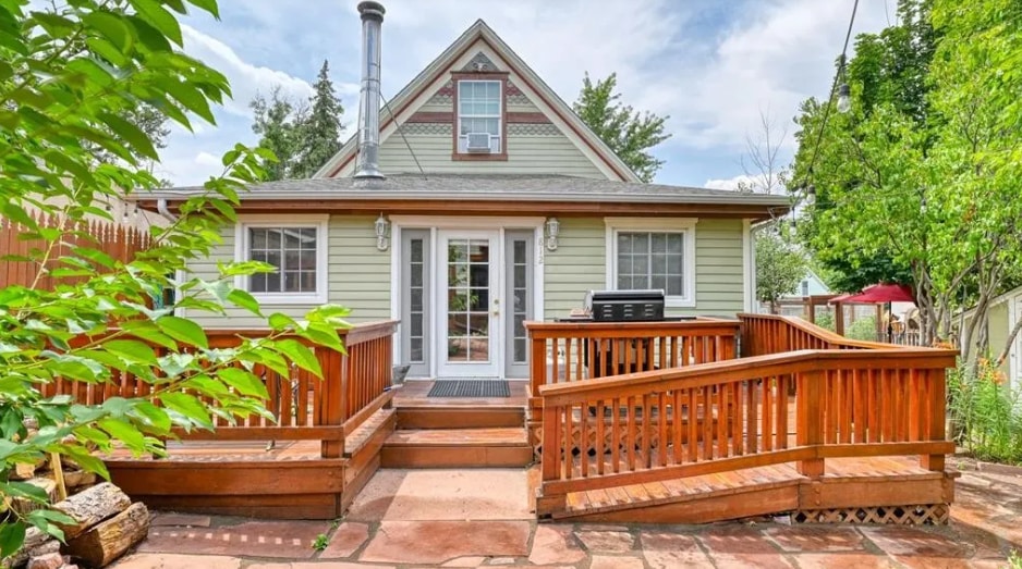 Spectacular rear deck and patio for outdoor dining and BBQs with friends. - 812 E Cache La Poudre St