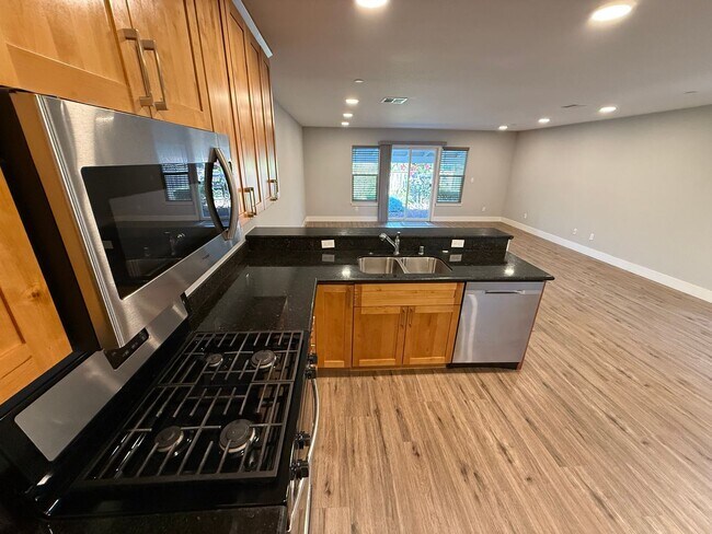 Building Photo - NEW PHOTOS! Two-level home located in Coff...
