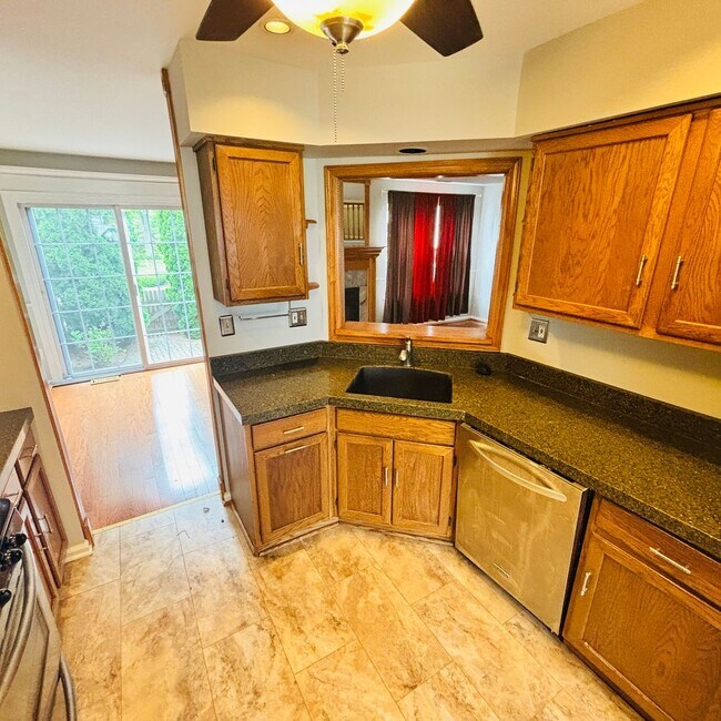 Building Photo - Spacious 3-Bedroom, 3-Bathroom Townhome with Finished Basement, Garage & Fenced Yard