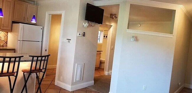 Building Photo - One Bedroom Condo Walking Distance to CU with Fenced Backyard and Flatiron Views!