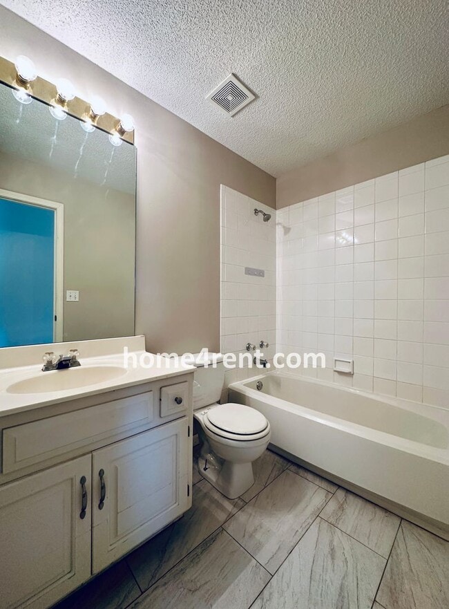 Building Photo - Brand New Paint, Wood Floors, Walkout Fini...