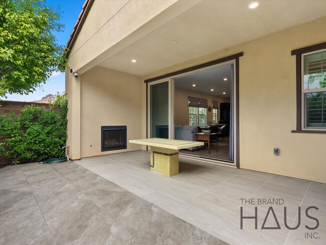 Building Photo - Rare 55+ Gated Travata Community – Bedrooms on Main + Loft + Resort-Style Amenities!