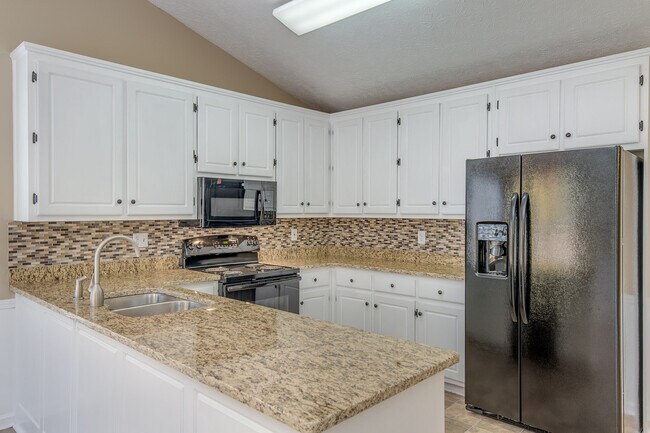 Building Photo - Cute Ranch Beauty in Covington, Fenced Back yard: Granite counter tops