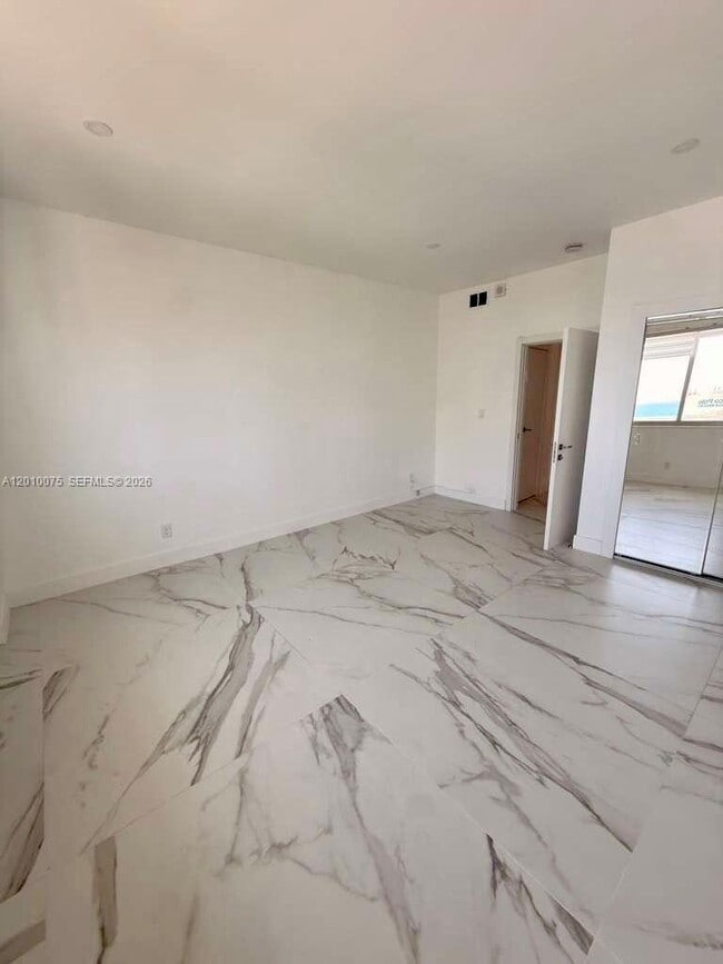 Building Photo - 19370 Collins Ave