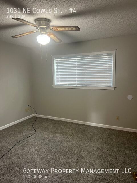 Building Photo - 1031 NE Cowls St