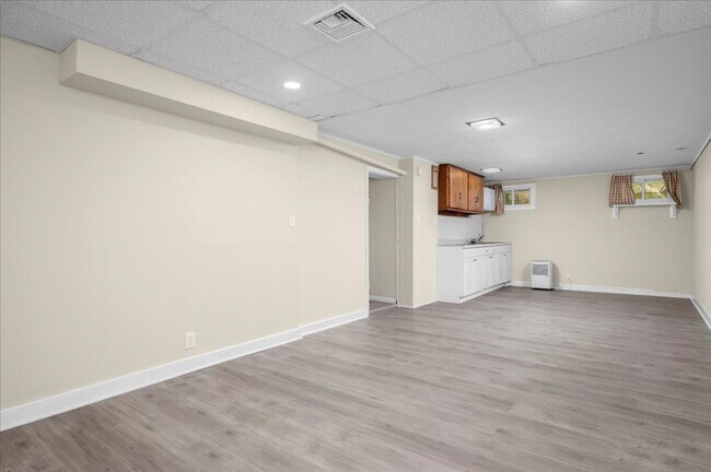 Building Photo - Elegant Multi-Level Brick Residence with Outdoor Oasis