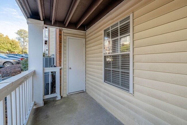 Building Photo - Spacious 2-Bedroom Elite Apartment with Private Balconies & Washer/Dryer