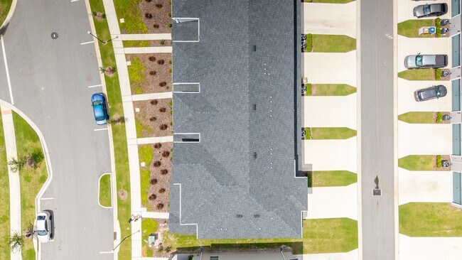 Building Photo - 3BR Center Lake Townhome | 2-Car Garage, Loft & Resort-Style Amenities