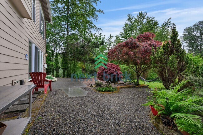 Building Photo - "Spacious 4-Bedroom Retreat with 4.5 Baths in Scenic Snohomish - Your 4400 Sq Ft Haven Awaits!"