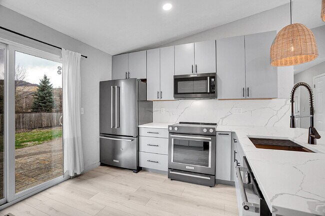 Building Photo - $3,295.95 - 3 bed, 2 bath updated Home in Littleton with Two Full Kitchens and Impressive Yard!