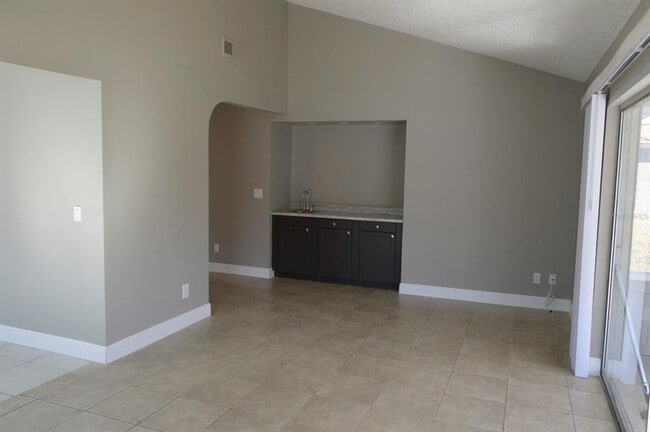 Building Photo - 6525 Manila Palm Way