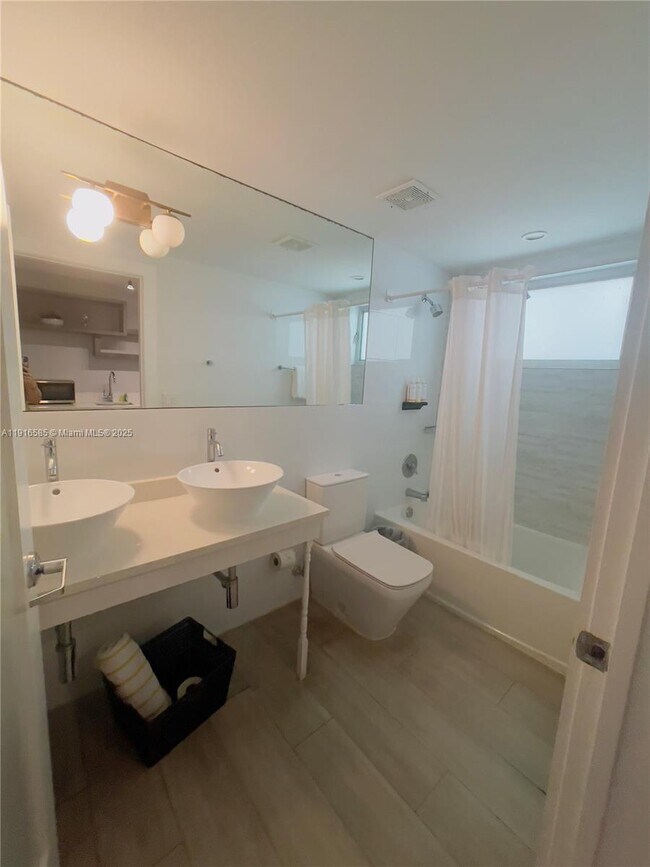 Building Photo - 6755 Harding Ave