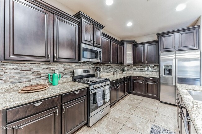 Building Photo - 7657 S Debra Dr