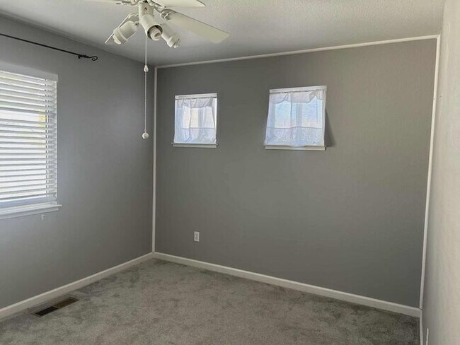 Building Photo - Welcome to this STUNNING 4-bedroom, 2.5-ba...