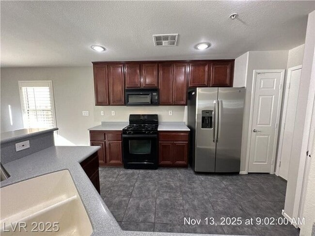 Building Photo - UPGRADED HENDERSON HOME IN GATED COMMUNITY!!