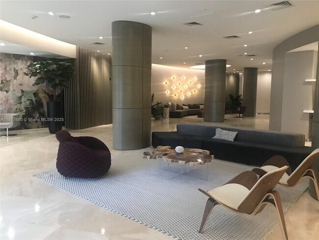 Building Photo - 10275 Collins Ave