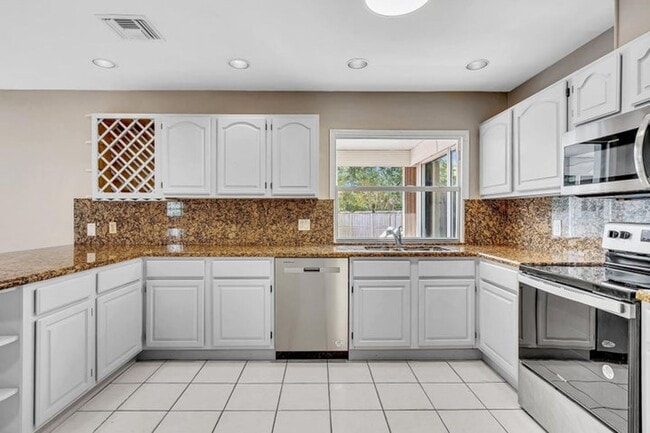 Building Photo - 6144 Royal Lytham Dr