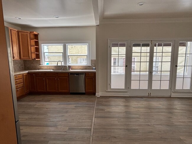 Kitchen / Dining / Balcony - 1248 S Rimpau Blvd