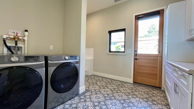 Building Photo - Exceptional New Construction Single-Level 4 Bedroom SLO View Home with Roof Deck