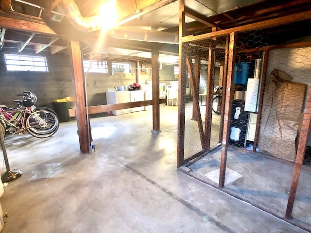 Basement storage (see empty locker on right), bike rack and laundry. - 7222 East Burnside