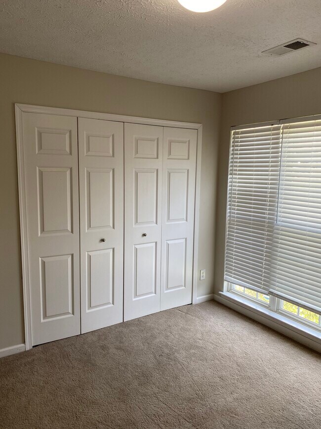 Front bedroom closet - 709 Warmstone Ct
