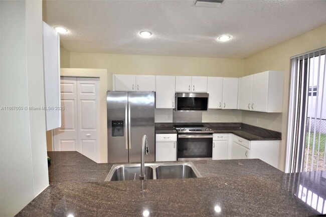 Primary Photo - 6161 NW 58th Way