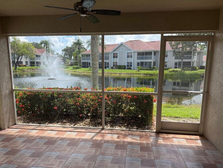 Lanai with lake view - 9836 Luna Cir