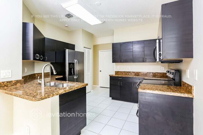 Building Photo - 10642 NW 1st Ct