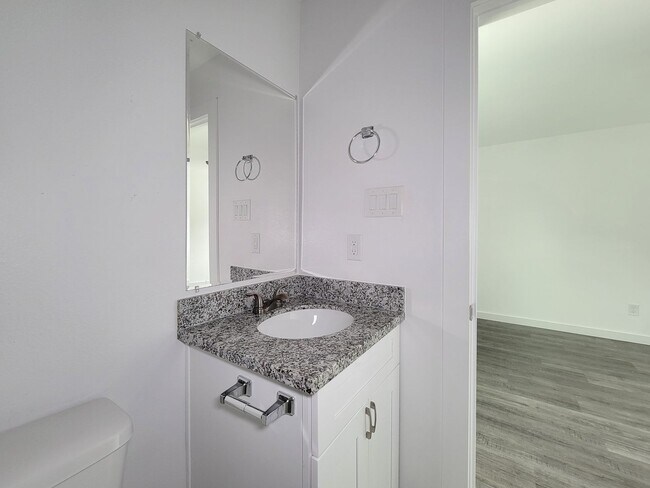 Building Photo - This newly constructed 3-bedroom, 2-bathroom unit offers modern living with 1,150 sq ft of space....