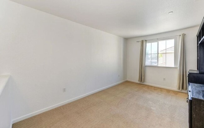 Building Photo - Experience Esplanade! Premier Townhome Com...