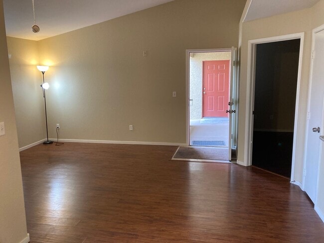 Building Photo - Gated community just minutes south of the strip, 2br/2bath, 2nd floor condo.