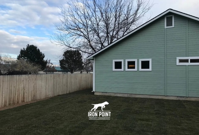 Building Photo - 3bed/2bath - Landscaping Included plus fenced yard, & two car garage.