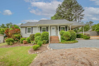 Building Photo - "Charming 3-Bedroom Home in Pinehurst with...