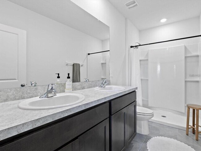 Building Photo - 8689 Milestone Dr