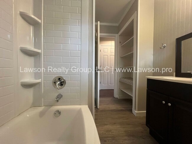 Building Photo - Charming Brick Ranch with Beautifully Land...