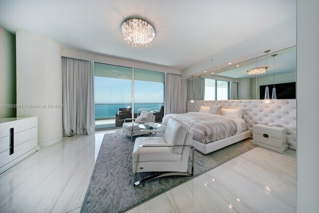 Building Photo - 10203 Collins Ave
