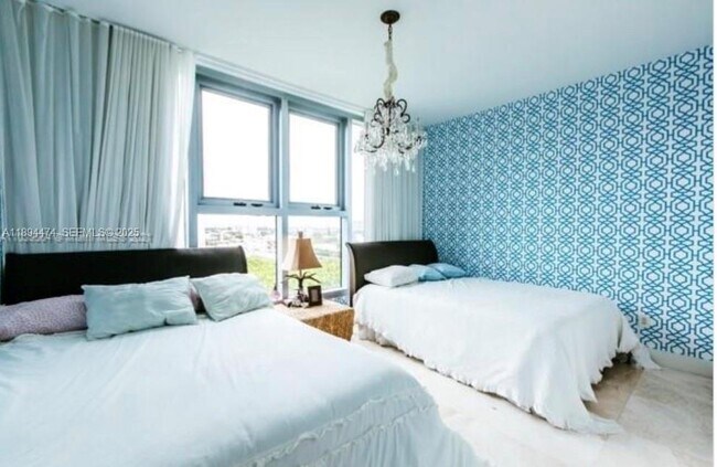 Building Photo - 6899 Collins Ave